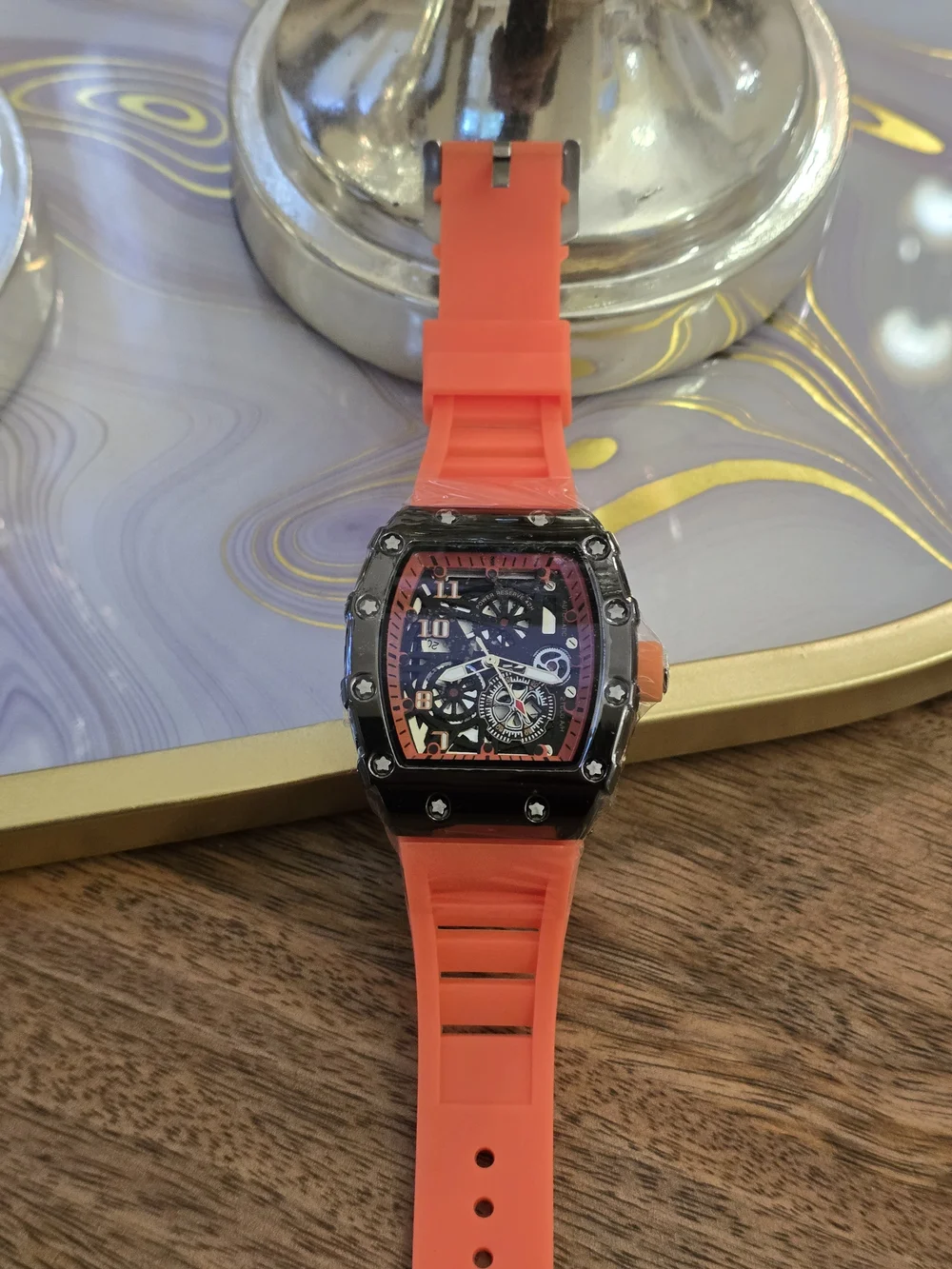 The Unbranded Brand striking orange